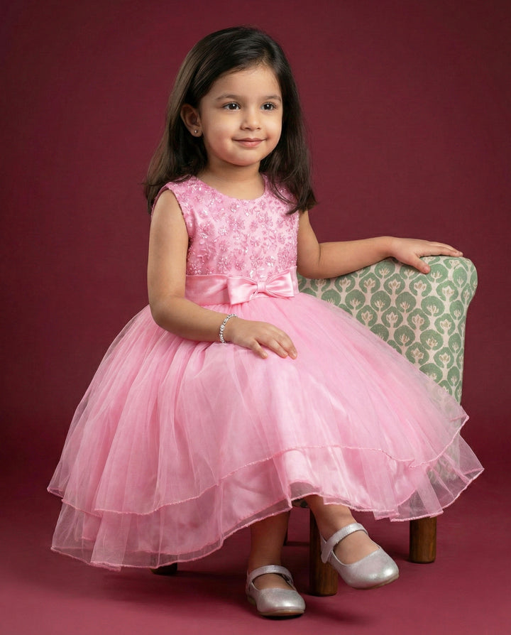 Baby Pink Designer Layered Frock
Fabric: Babypink mono net with premium same colour threadwork detailing on the yoke portion  Beautifully designed outfit for Baby girls with smooth lining for comfo