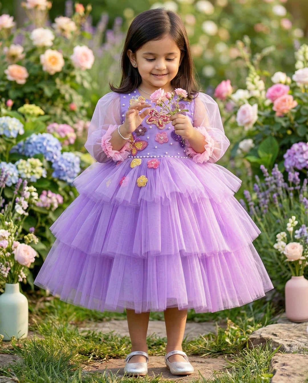 Lavender Butterfly Applique step Frock.
Material: Lavender Shade Butterfly Applique three step frock.Premium quality lilac colour satin is used as the lining and lavender colour nylon net is used in three