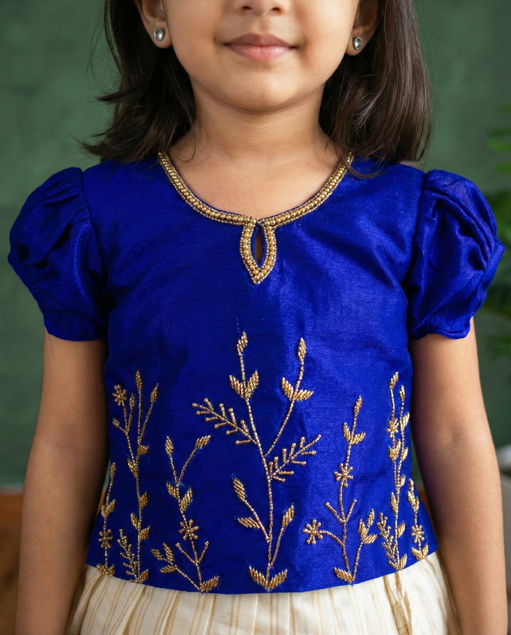Cream royal blue kasavu lehenga choli side view – Stanwells Kids