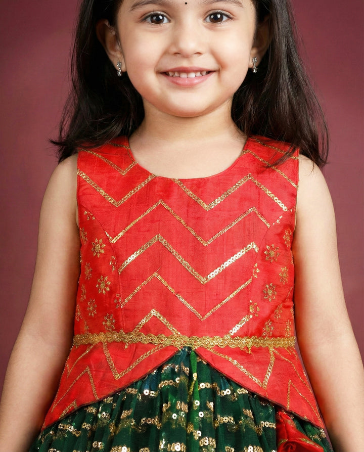 Bottle green and red sequin embroidery lehenga choli for baby girls

Traditional South Indian birthday dress for girls

Embroidered festive wear lehenga for toddlers

Designer sequin work partywear dress for kids

Baby girls ethnic lehenga choli set

Stanwells Kids festive birthday outfit

Green red designer lehenga for baby girls