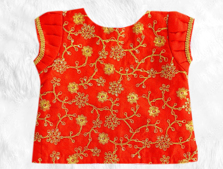 Orange Silk Thread Embroidered Traditional Lehenga Choli SetFabric: Orange Fantom silk material with a detailing thread embroidery and golden border on the end portionColour: Orange | Sleeve type: Puff Sleeves| Neck type: Rou