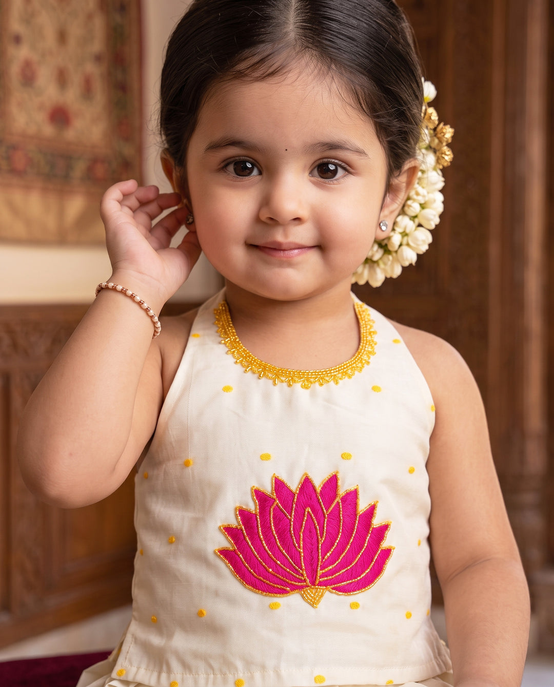 Onam special cream silk lotus hand embroidery lehenga for baby girl – front view, Stanwells Kids