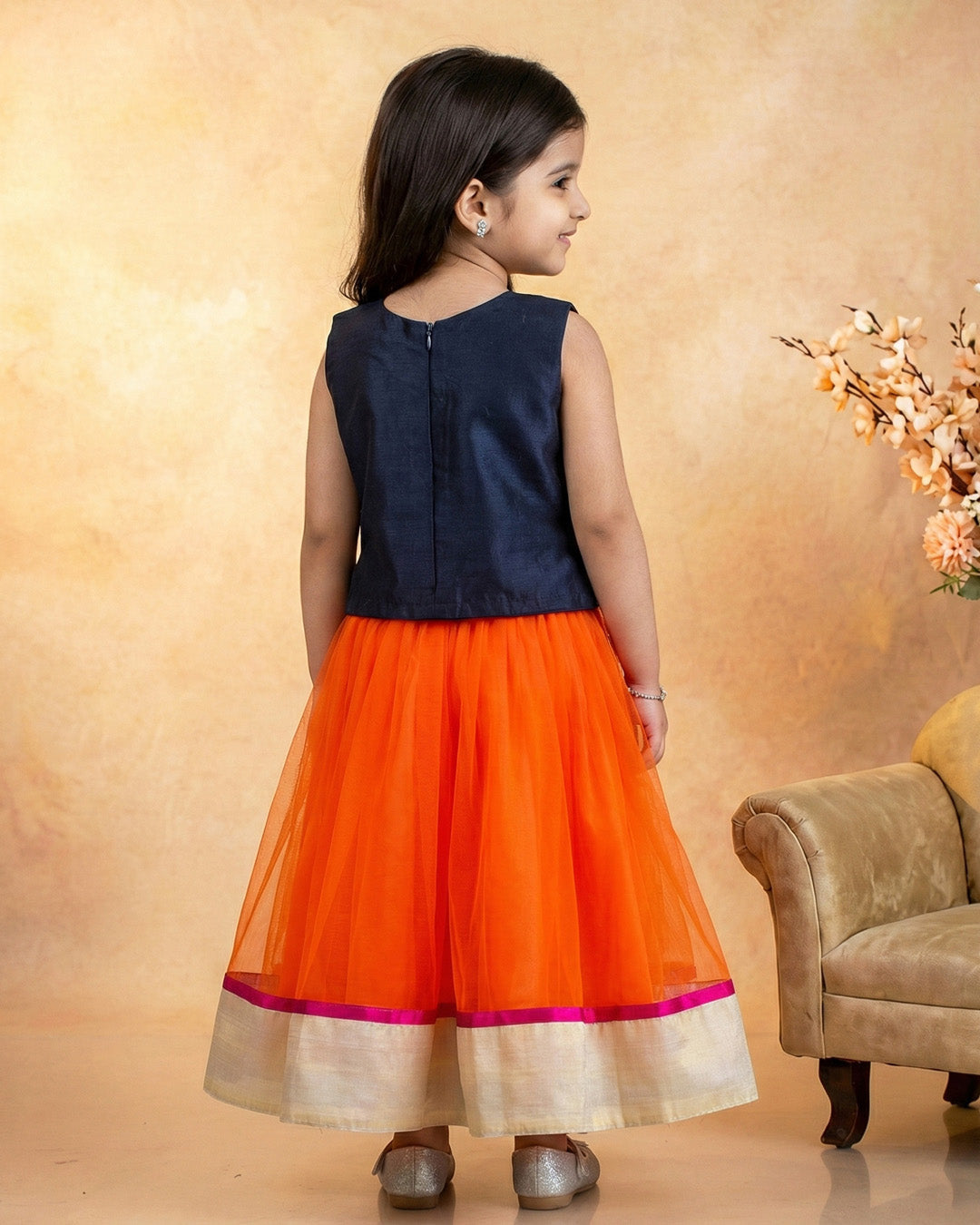 Orange and black combo lehenga choli set for baby girls

Traditional birthday dress for girls

Baby girls festive wear lehenga

Stylish ethnic dress for toddlers

Black orange designer lehenga for baby girls

Kids partywear traditional dress

Stanwells Kids ethnic birthday outfit