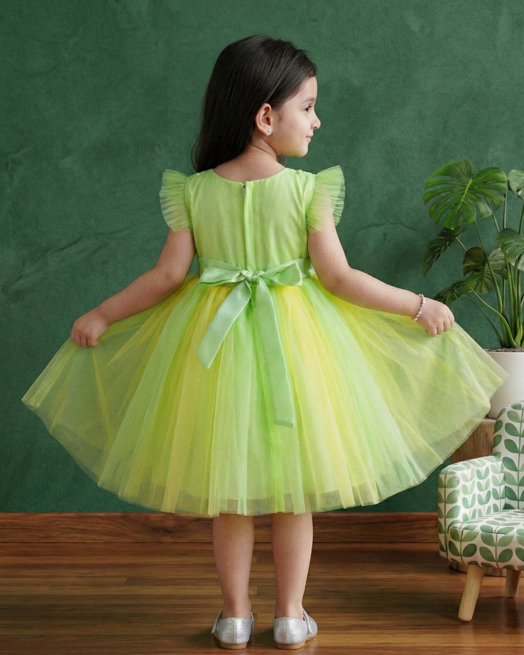 Light green and baby yellow birthday frock for baby girls

Partywear dress for girls 6M–8Y

Stylish dual-color frock for toddlers

Elegant baby girls birthday outfit

Festive wear frock for kids

Stanwells Kids yellow green party dress

Designer birthday frock for baby girls