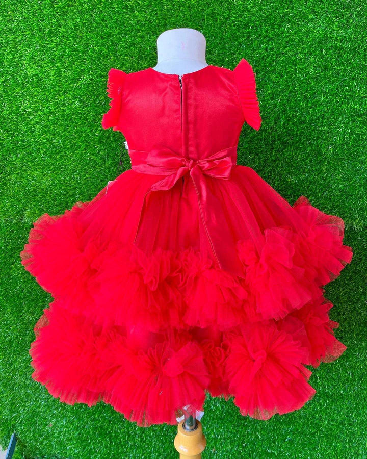 Red Layered Pleated Heavy Ruffled Hand embroidery Birthday Frock

Material: Bright red nylon mono net with layered and ruffles on the end portion. Yoke portion is designed with pleated pattern and a handwork in the centre portion