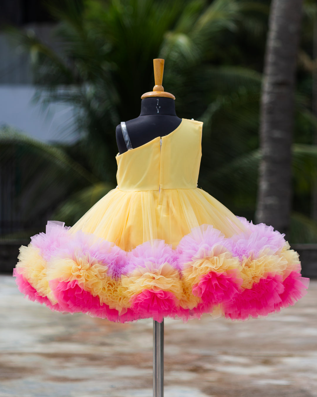 Back view of baby yellow multi shade ruffles floral frock – Stanwells Kids