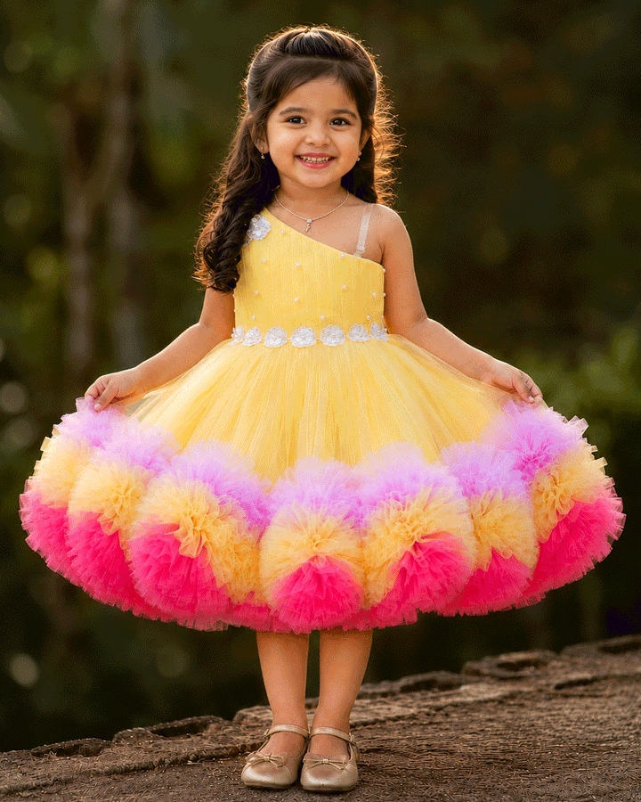 Baby yellow multi shade ruffles floral frock for baby girl – front view, Stanwells Kids