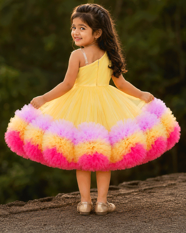 Back view of baby yellow multi shade ruffles floral frock – Stanwells Kids