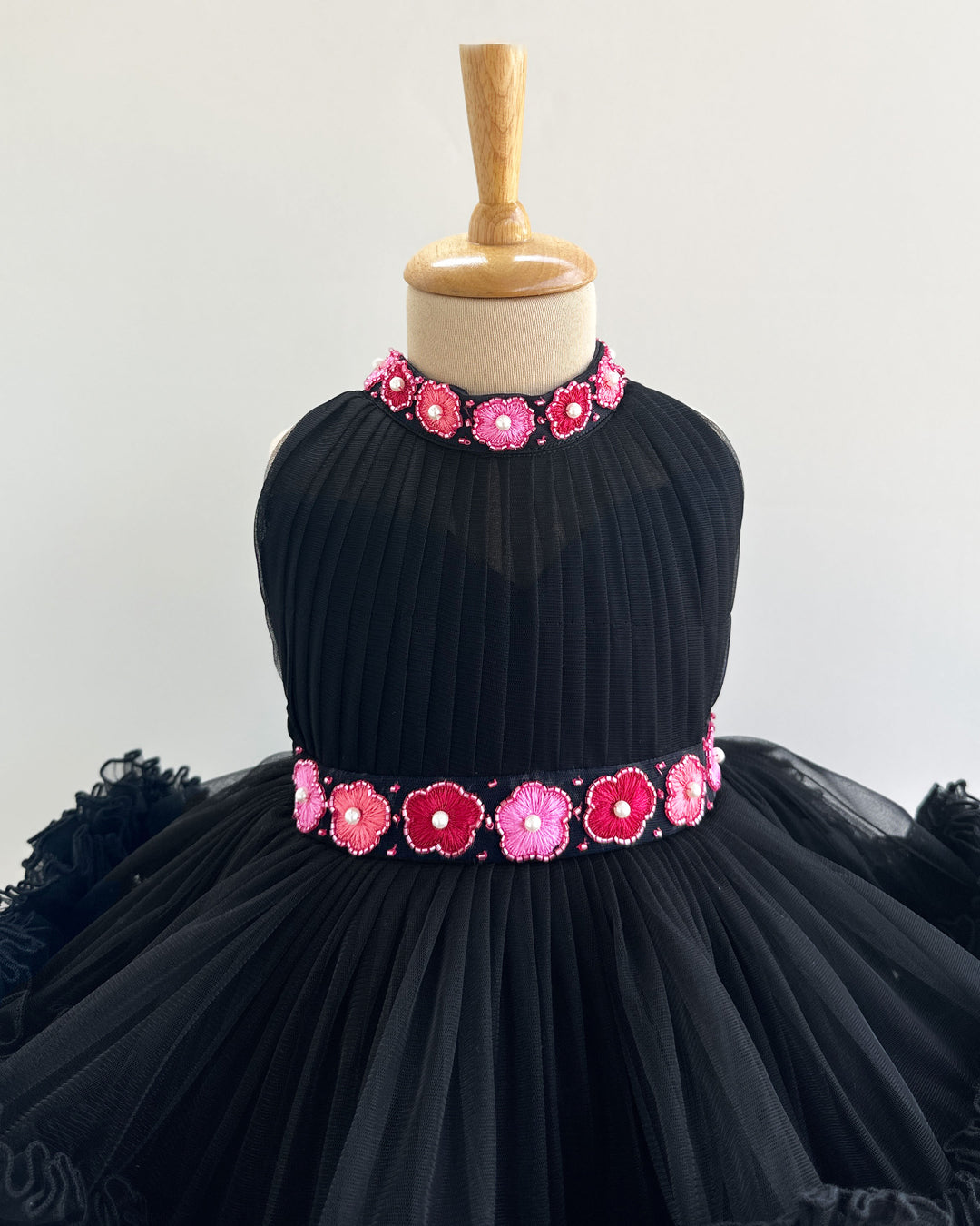 Black halter neck baby girl birthday frock

Hand-embroidered toddler party dress

2-step layered black birthday frock

Elegant black frock for baby girls

Stylish halter neck baby dress​

