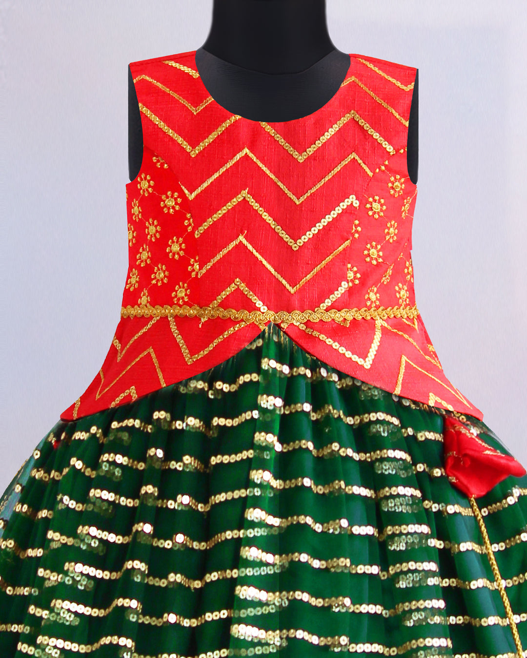 Bottle green and red sequin embroidery lehenga choli for baby girls

Traditional South Indian birthday dress for girls

Embroidered festive wear lehenga for toddlers

Designer sequin work partywear dress for kids

Baby girls ethnic lehenga choli set

Stanwells Kids festive birthday outfit

Green red designer lehenga for baby girls