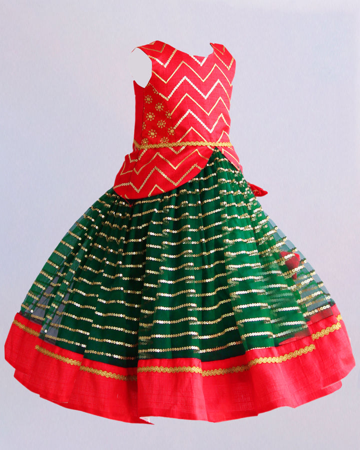 Bottle green and red sequin embroidery lehenga choli for baby girls

Traditional South Indian birthday dress for girls

Embroidered festive wear lehenga for toddlers

Designer sequin work partywear dress for kids

Baby girls ethnic lehenga choli set

Stanwells Kids festive birthday outfit

Green red designer lehenga for baby girls