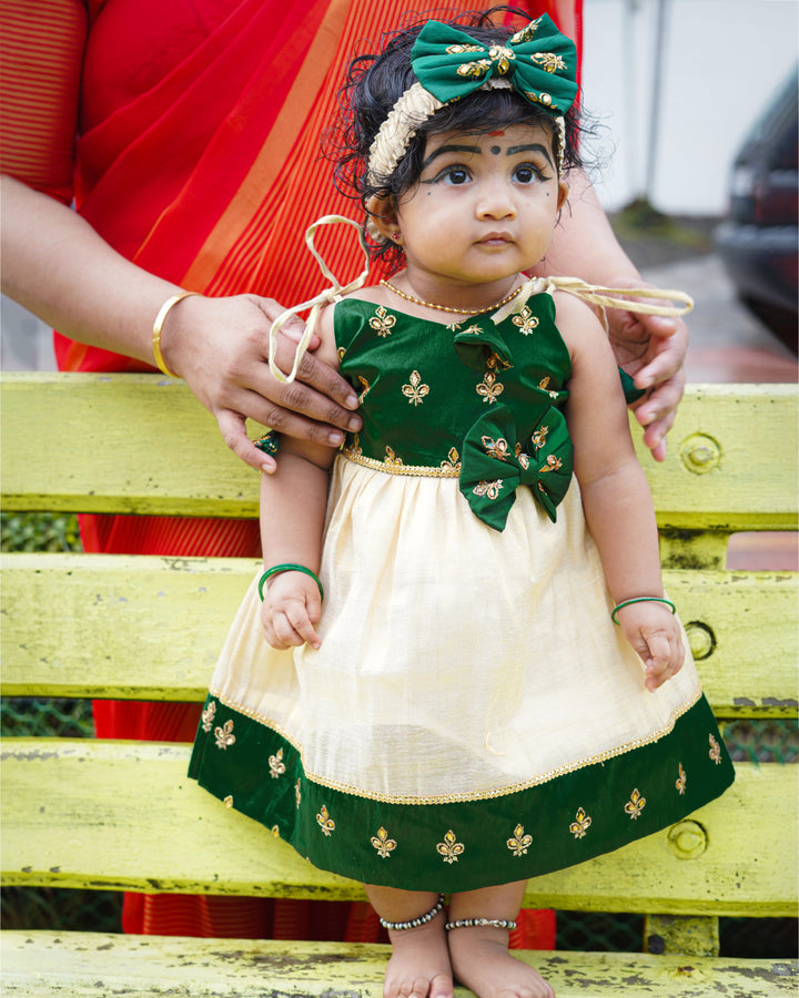 Baby girls birthday dress – bottle green cotton Kettuduppu frock with copper gold detailing