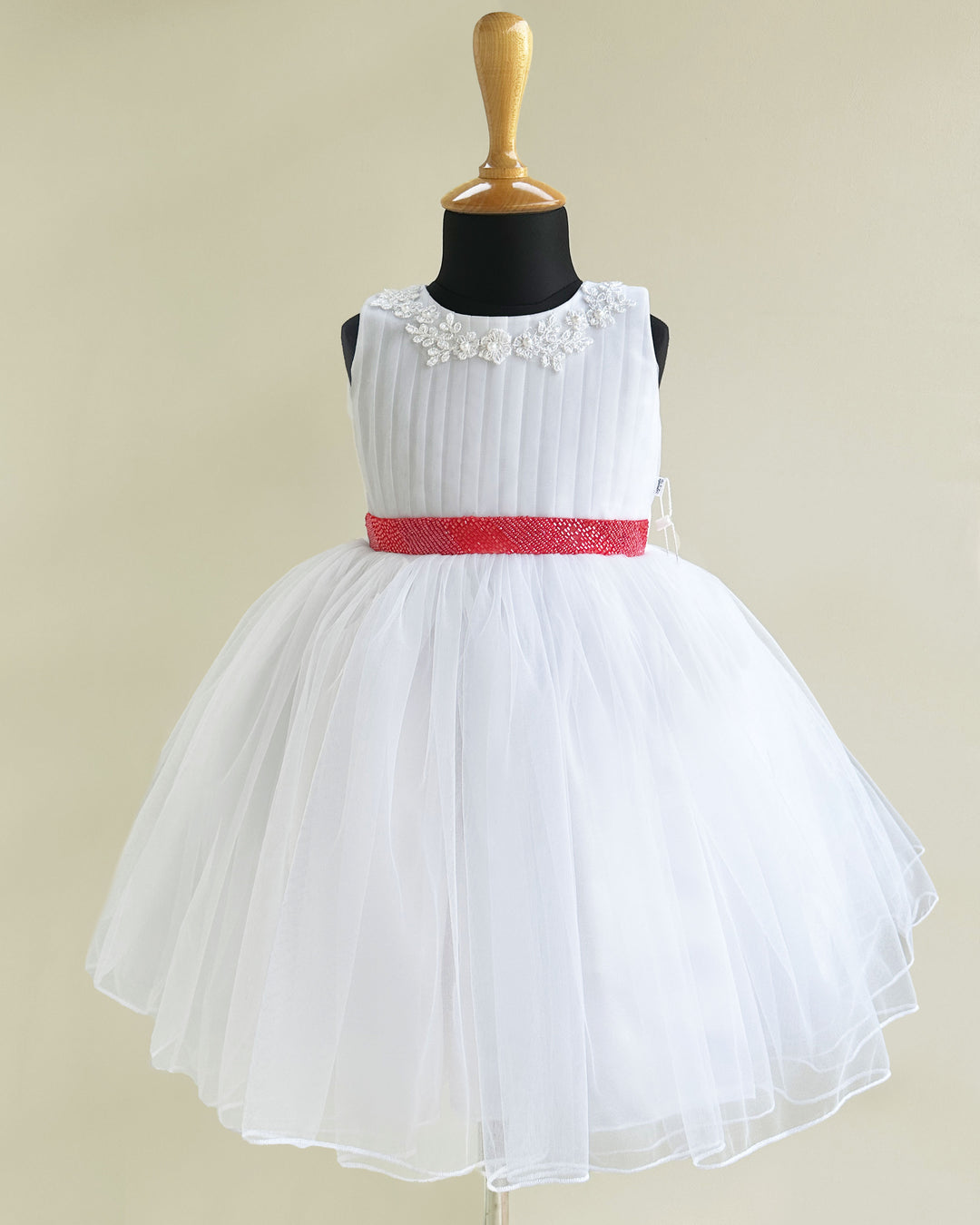 "Christmas special baby girls white pleated sleeveless birthday dress, handwork frock, party dress for girls, festive outfit for toddlers."