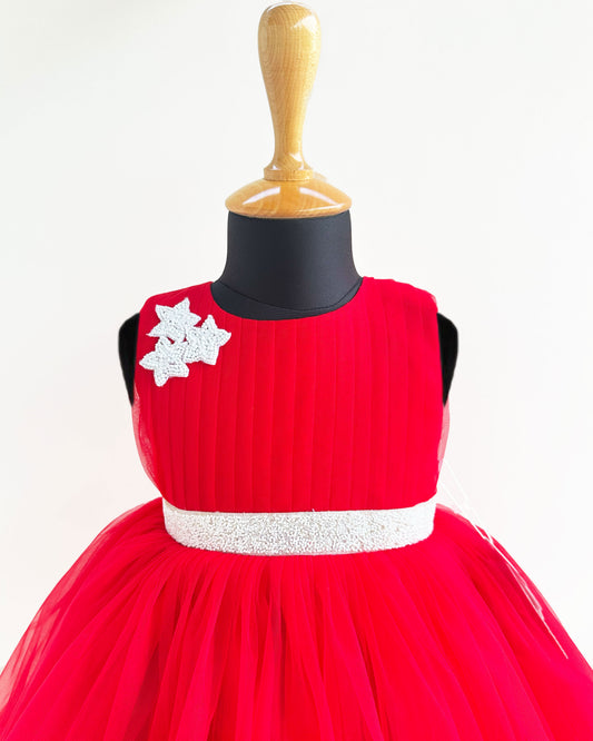 Red star pleated yoke Christmas birthday frock front view – Stanwells Kids