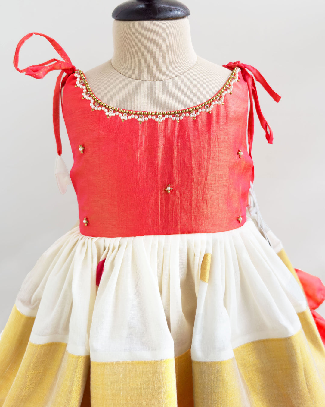Cream peach kettuduppu frock golden kasavu border detail – Stanwells Kids