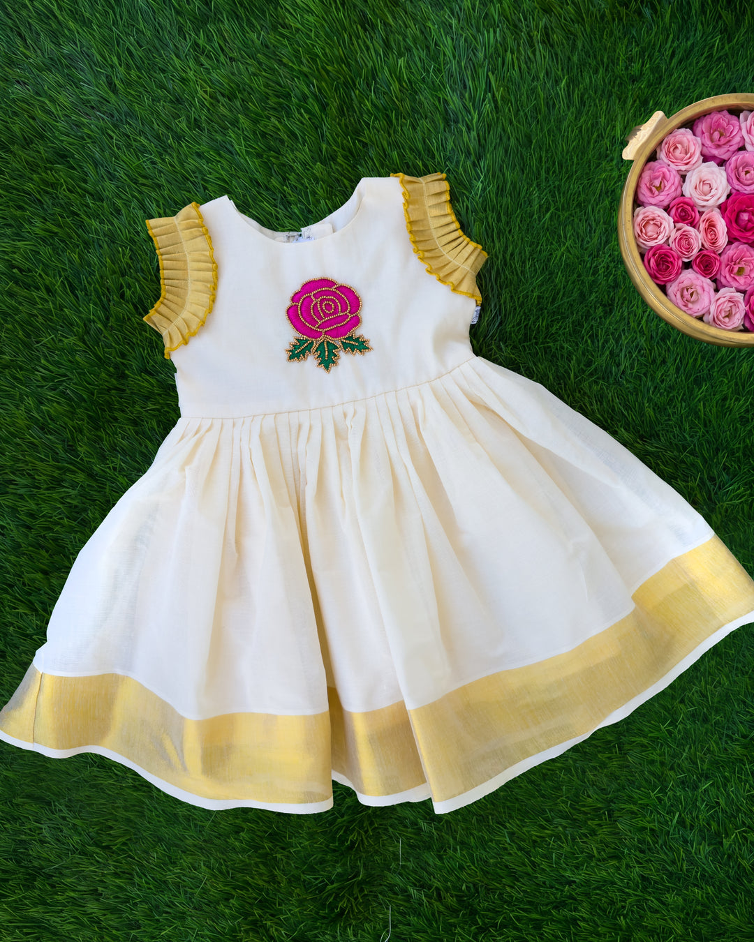 Cream floral handwork Kerala traditional handloom Kasavu frock for baby girl – front view, Stanwells Kids