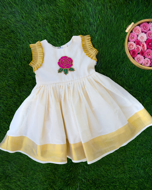 Cream floral handwork Kerala traditional handloom Kasavu frock for baby girl – front view, Stanwells Kids