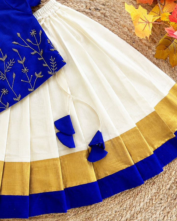 Cream Kerala Kasavu skirt with traditional gold border