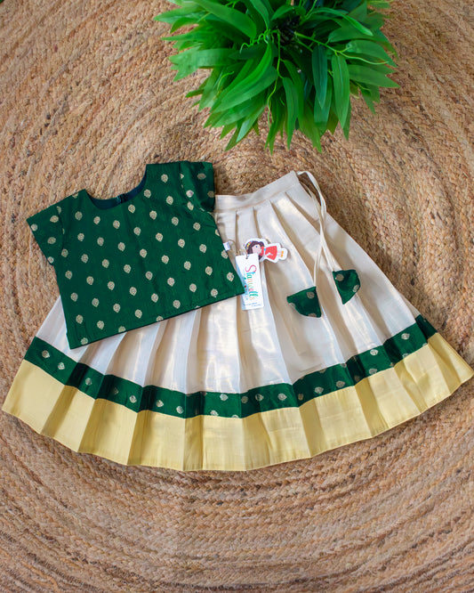 Cream and bottle green Butti embroidery Kerala lehenga choli for baby girl – front view, Stanwells Kids