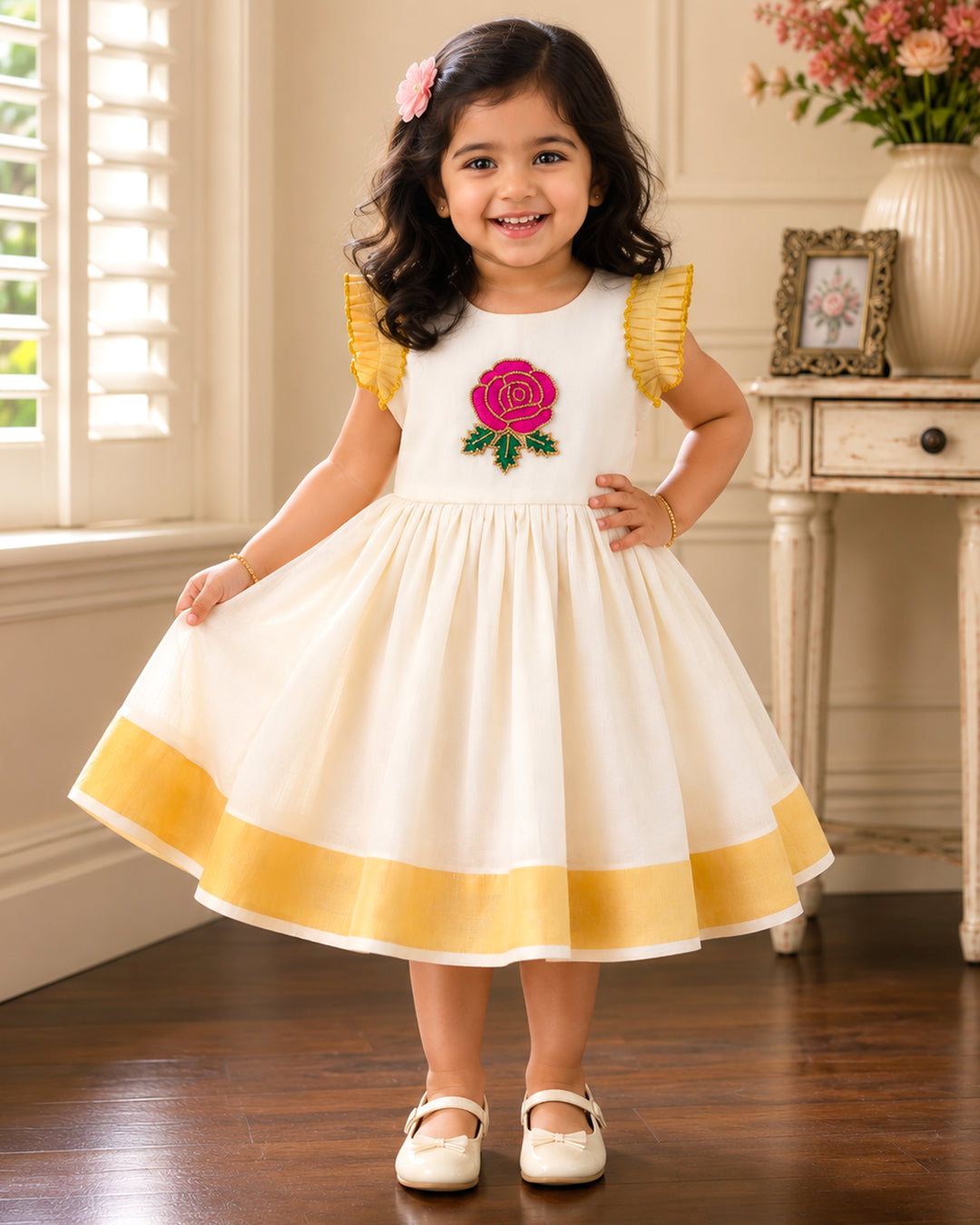 Cream floral handwork Kerala traditional handloom Kasavu frock for baby girl – front view, Stanwells Kids
