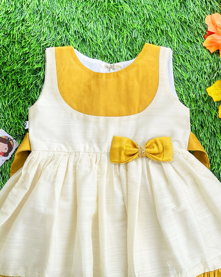 Cream gold Kerala traditional ruffle bow frock – baby girls birthday dress