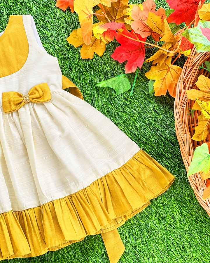 Cream gold Kerala traditional ruffle bow frock – baby girls birthday dress