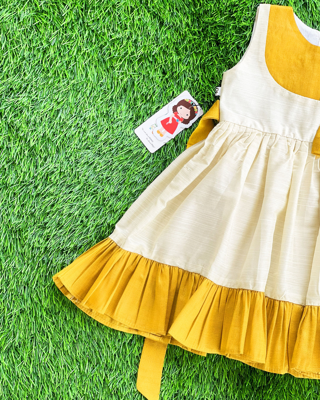 Cream gold Kerala traditional ruffle bow frock – baby girls birthday dress