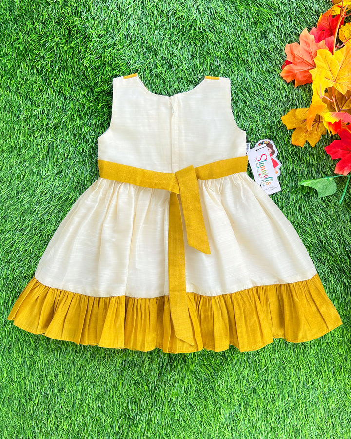 Cream gold Kerala traditional ruffle bow frock – baby girls birthday dress