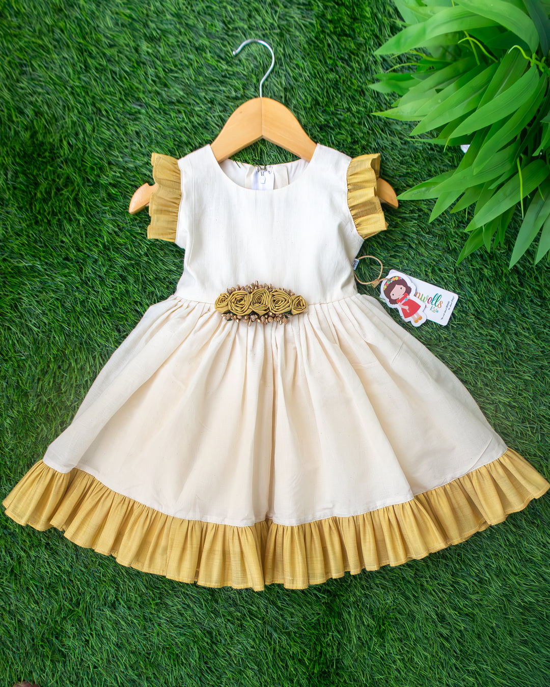 Cream and gold tissue Kerala handloom flower frock for baby girl – front view, Stanwells Kids