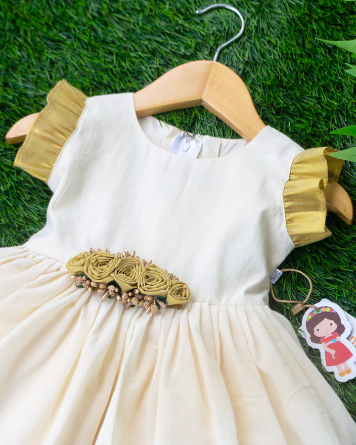 Red golden floral centre detail on cream gold tissue Kerala handloom frock – Stanwells Kids