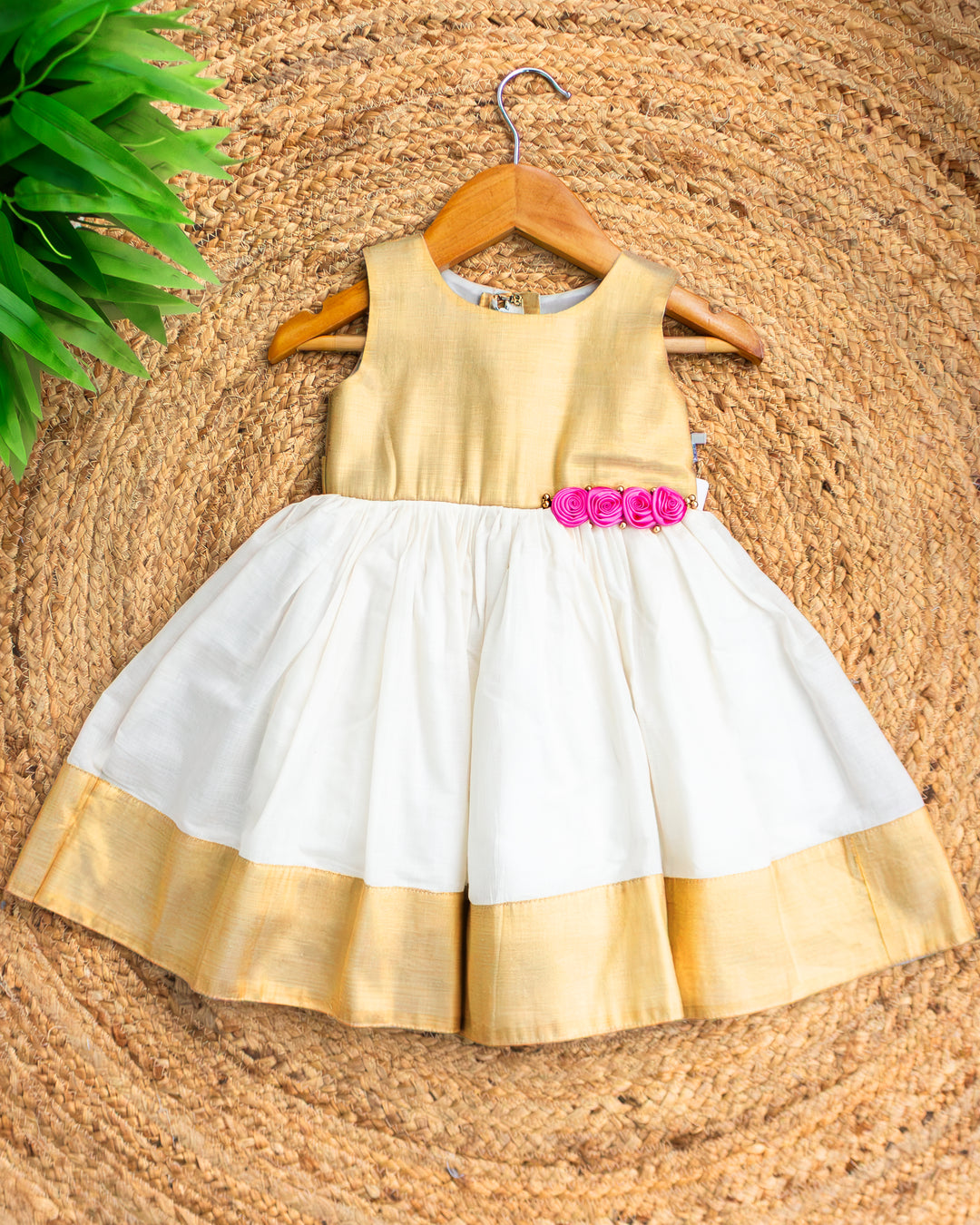 Cream and gold traditional Onam ethnic frock for baby girl – front view, Stanwells Kids