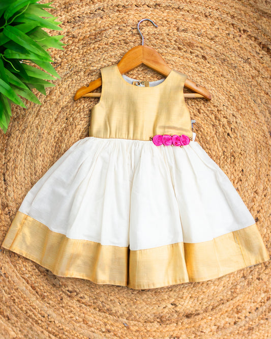 Cream and gold traditional Onam ethnic frock for baby girl – front view, Stanwells Kids