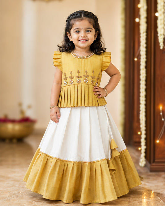 Cream and gold Kerala handloom Onam handwork lehenga choli for baby girl – front view, Stanwells Kids