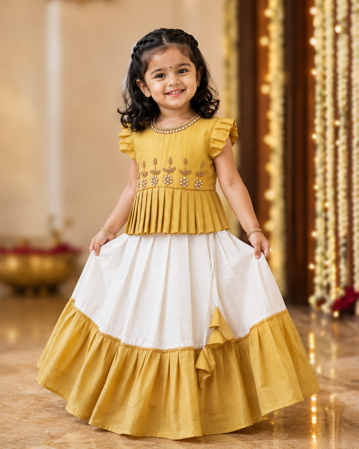 Cream and gold Kerala handloom Onam handwork lehenga choli for baby girl – front view, Stanwells Kids