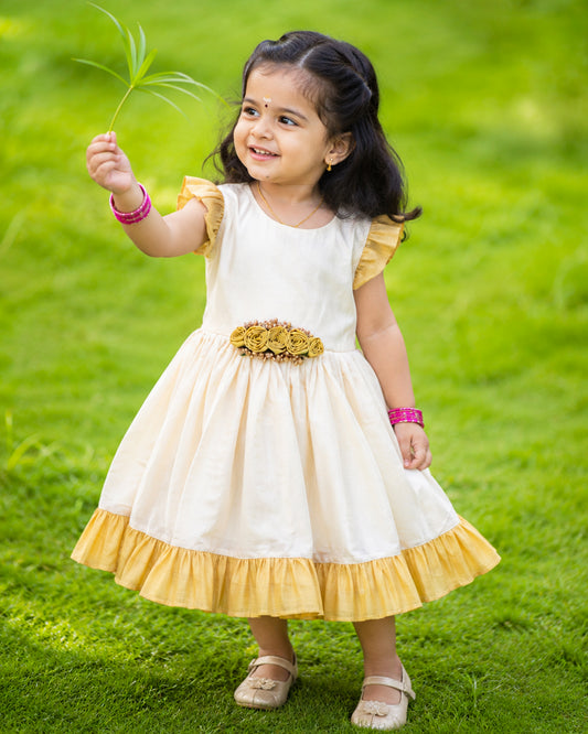 Cream and gold tissue Kerala handloom flower frock for baby girl – front view, Stanwells Kids