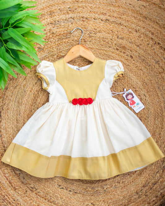 Cream and golden Kerala traditional Onam frock for baby girl – front view, Stanwells Kids