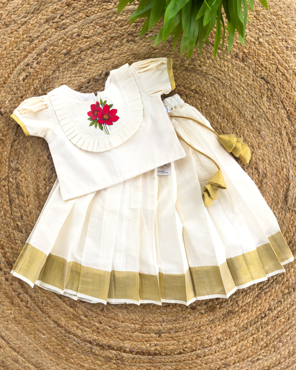 Onam special cream golden Kasavu flower lehenga choli – front view, Stanwells Kids