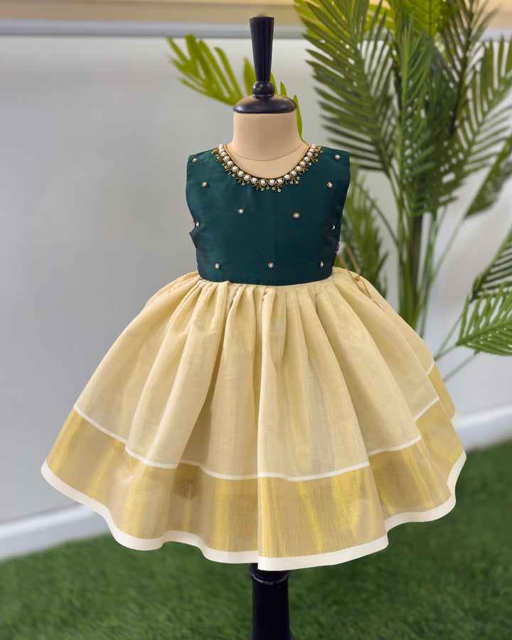 Cream and green handwork Onam traditional frock for baby girl – front view, Stanwells Kids