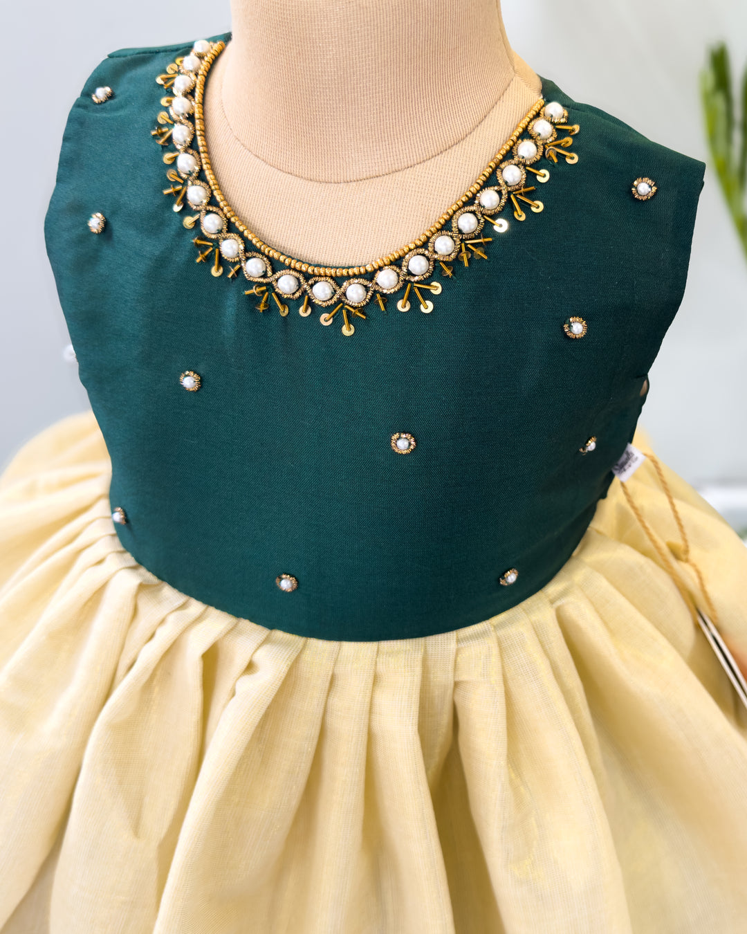 Golden Kasavu handwork detailing on cream green Onam traditional frock – Stanwells Kids
