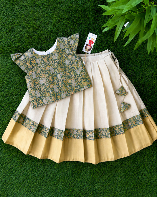 Rich golden tissue brocade detailing on cream green Banarasi Onam lehenga – Stanwells Kids