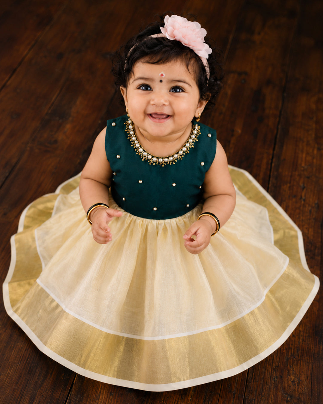 Cream and green handwork Onam traditional frock for baby girl – front view, Stanwells Kids