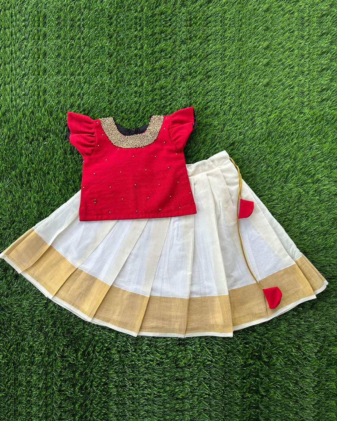 Baby girls birthday dress cream maroon lehenga

Traditional cotton silk lehenga choli for toddlers

Handwork lehenga dress for baby girl's birthday

Cream maroon ethnic dress for baby girl celebration

Elegant baby girl festive outfit in cotton silk

