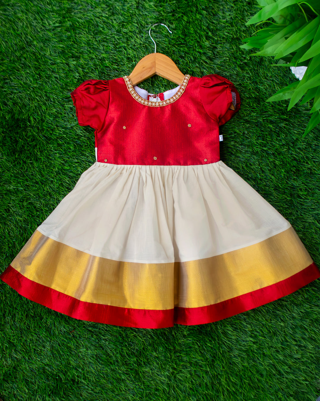 Cream and maroon Kerala handloom traditional handwork frock for baby girl – front view, Stanwells Kids