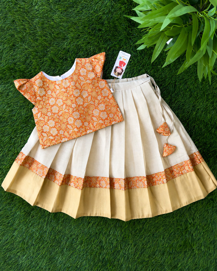Cream and orange Banarasi brocade lehenga choli for baby girl – front view, Stanwells Kids