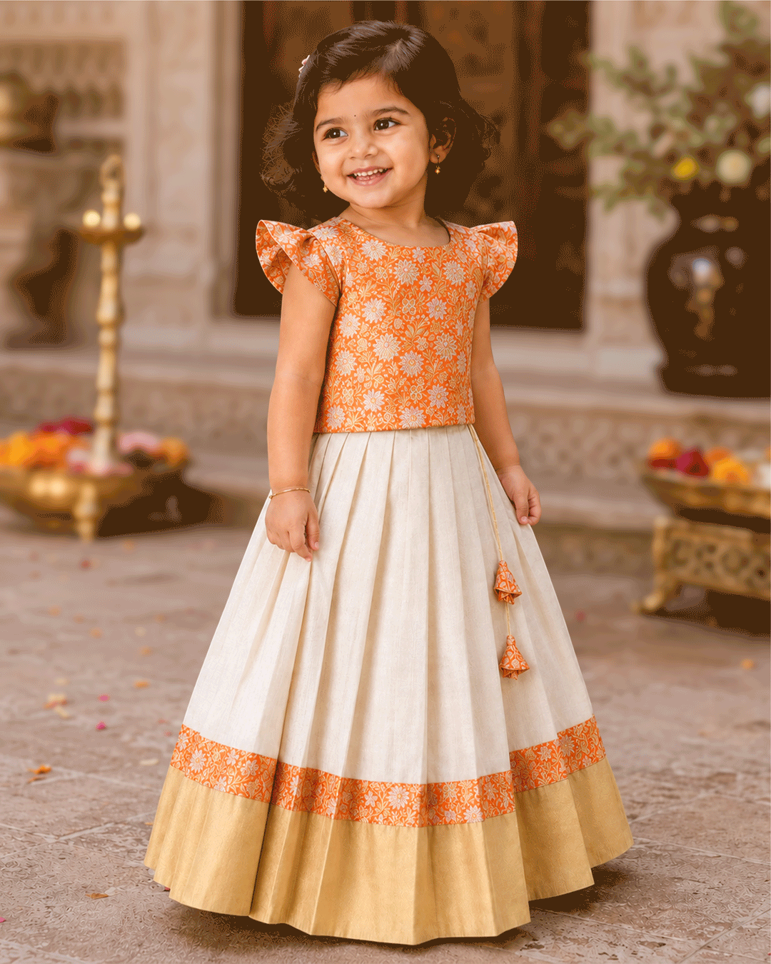 Cream and orange Banarasi brocade lehenga choli for baby girl – front view, Stanwells Kids