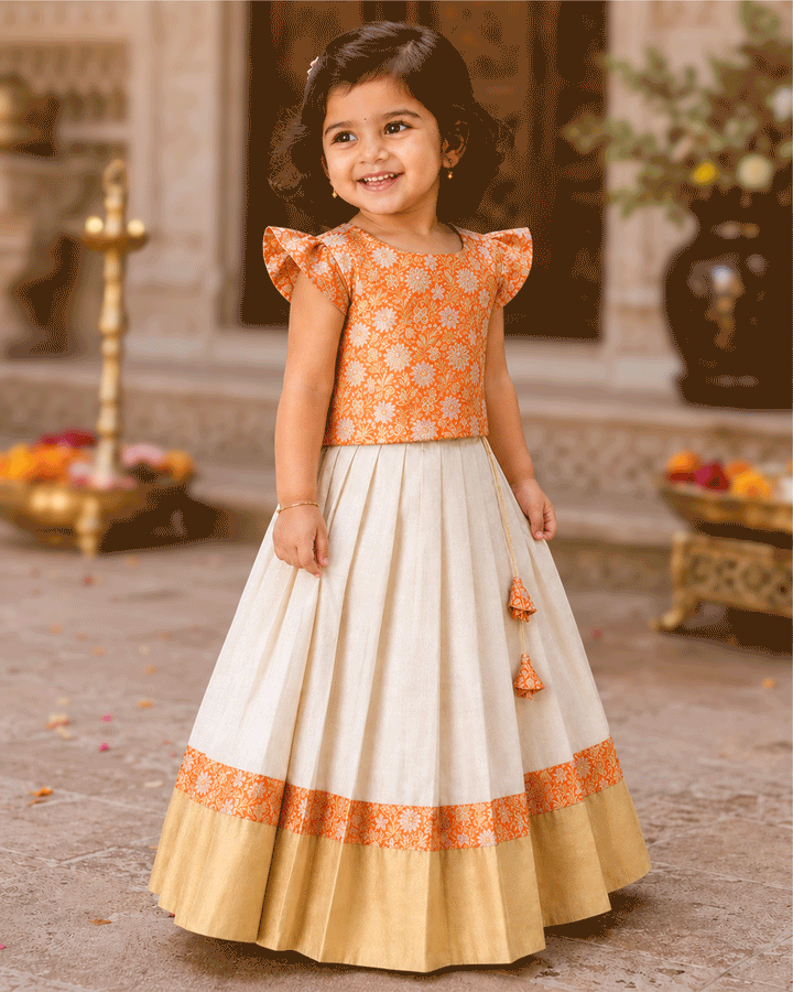 Cream and orange Banarasi brocade lehenga choli for baby girl – front view, Stanwells Kids