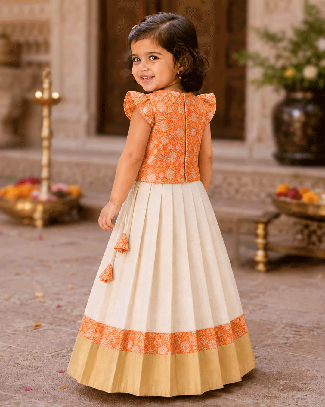 Cream and orange Banarasi brocade lehenga choli for baby girl – front view, Stanwells Kids
