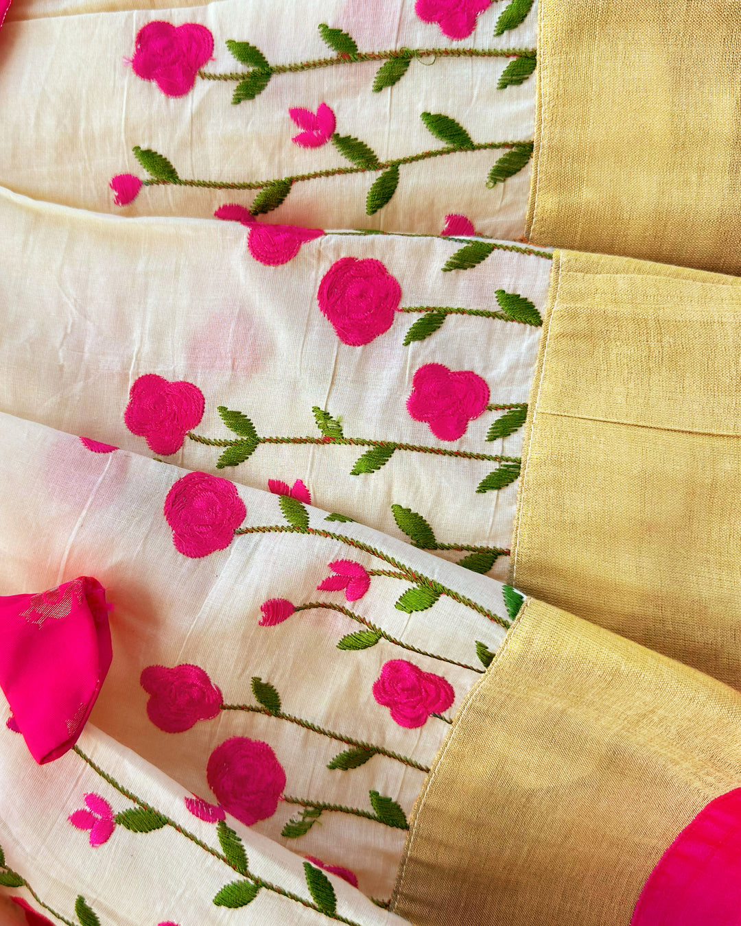 Cream and pink embroidered cotton lehenga for baby girls' birthdays.