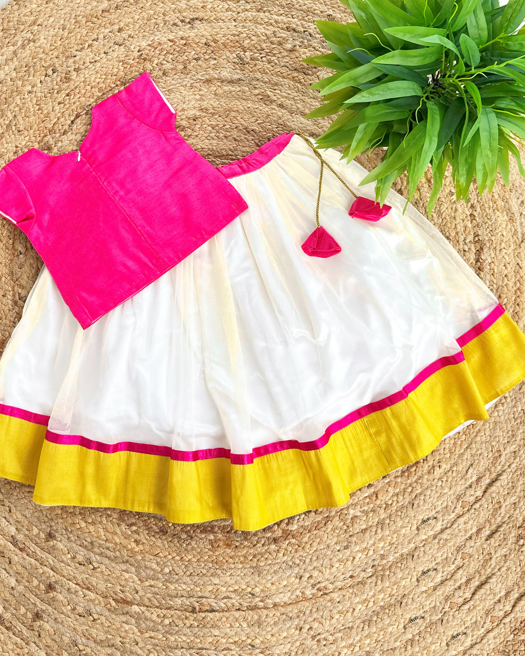 Kerala traditional lehenga choli for baby girl

cream pink birthday lehenga for kids

baby girls Kerala festive dress

ethnic lehenga choli for toddlers

Stanwells Kids Kerala lehenga outfit