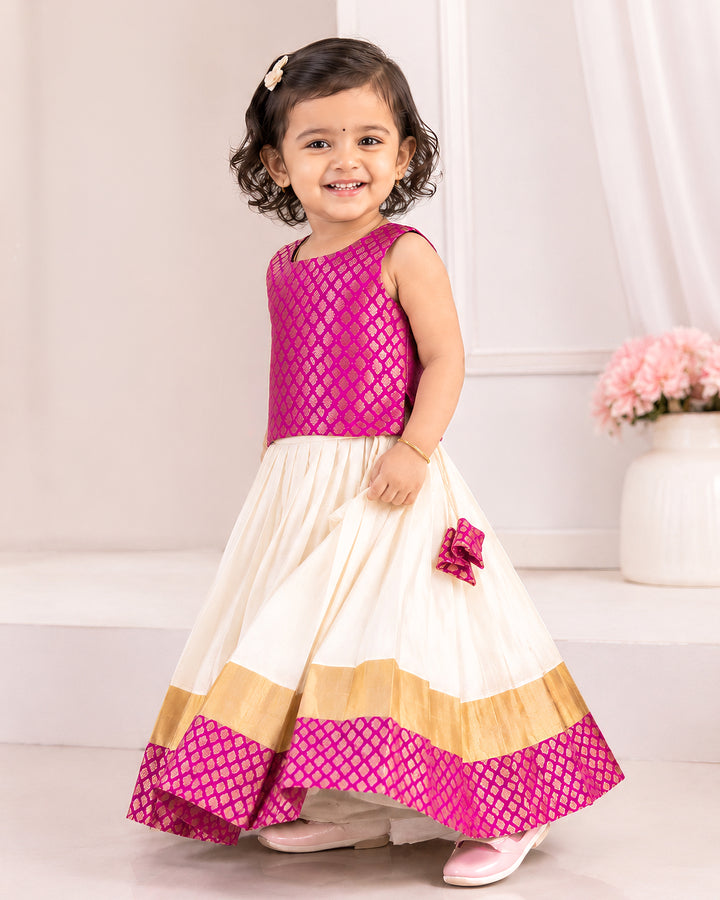 Onam special cream and pink Kasavu lehenga choli for baby girl, Stanwells Kids